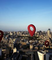 location-symbol-with-landscape-background